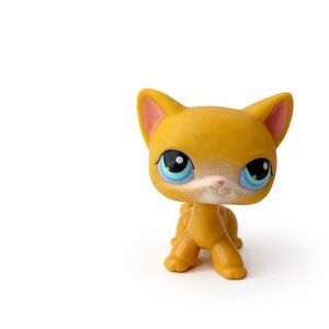 Hasbro Yellow Cat Toy with Blue Eyes